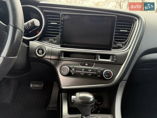 Белый Киа K5, объемом двигателя 2 л и пробегом 238 тыс. км за 11500 $, фото 12 на Automoto.ua