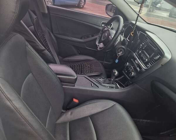 Белый Киа K5, объемом двигателя 2 л и пробегом 295 тыс. км за 8500 $, фото 10 на Automoto.ua