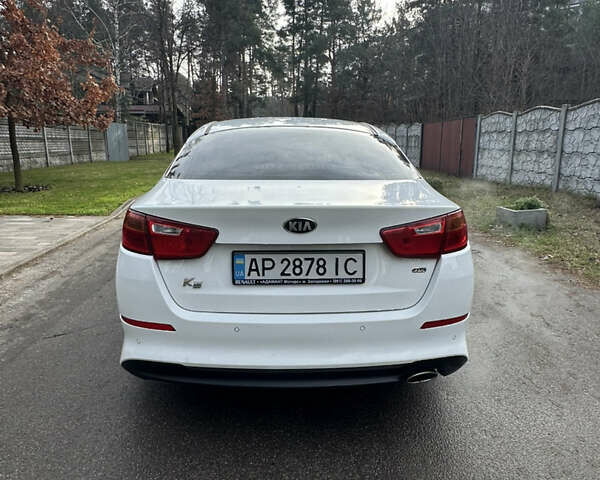 Белый Киа K5, объемом двигателя 2 л и пробегом 247 тыс. км за 7699 $, фото 6 на Automoto.ua