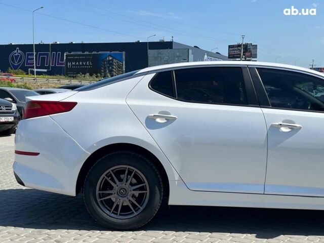 Белый Киа K5, объемом двигателя 2 л и пробегом 246 тыс. км за 10240 $, фото 6 на Automoto.ua