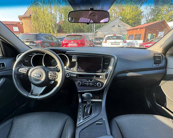 Белый Киа K5, объемом двигателя 2 л и пробегом 250 тыс. км за 10600 $, фото 4 на Automoto.ua