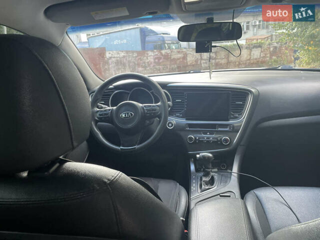 Белый Киа K5, объемом двигателя 2 л и пробегом 296 тыс. км за 12000 $, фото 13 на Automoto.ua