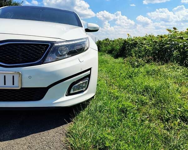 Білий Кіа K5, об'ємом двигуна 1.7 л та пробігом 197 тис. км за 13000 $, фото 4 на Automoto.ua