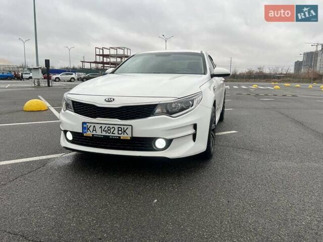 Белый Киа K5, объемом двигателя 2 л и пробегом 378 тыс. км за 9000 $, фото 9 на Automoto.ua