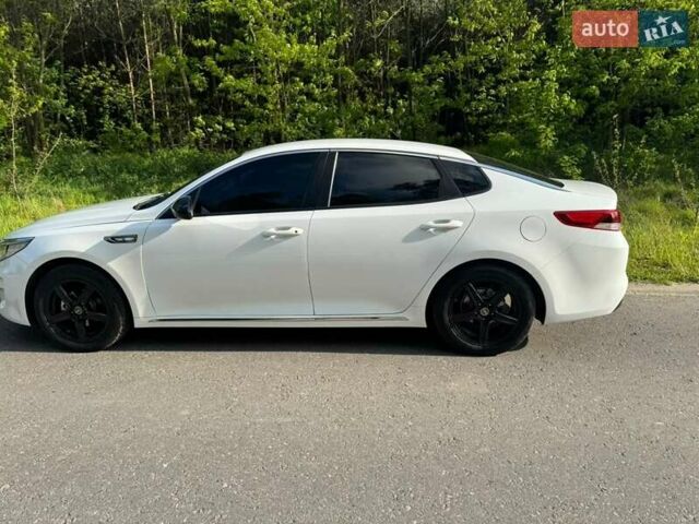 Белый Киа K5, объемом двигателя 2 л и пробегом 240 тыс. км за 10900 $, фото 8 на Automoto.ua