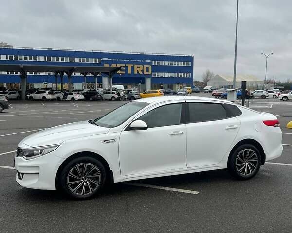 Белый Киа K5, объемом двигателя 2 л и пробегом 378 тыс. км за 9000 $, фото 16 на Automoto.ua