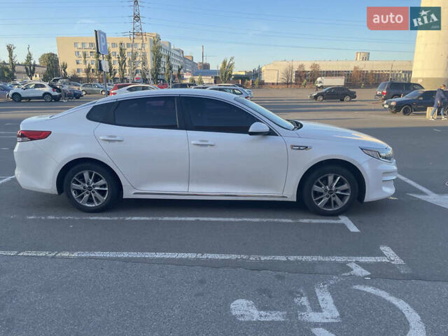 Белый Киа K5, объемом двигателя 2 л и пробегом 255 тыс. км за 11500 $, фото 1 на Automoto.ua