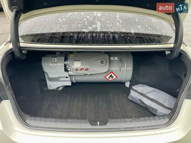 Белый Киа K5, объемом двигателя 2 л и пробегом 272 тыс. км за 12200 $, фото 7 на Automoto.ua