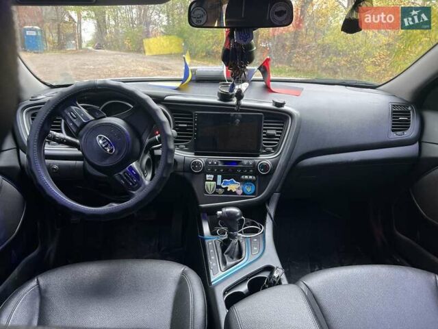 Белый Киа K5, объемом двигателя 2 л и пробегом 266 тыс. км за 9900 $, фото 5 на Automoto.ua