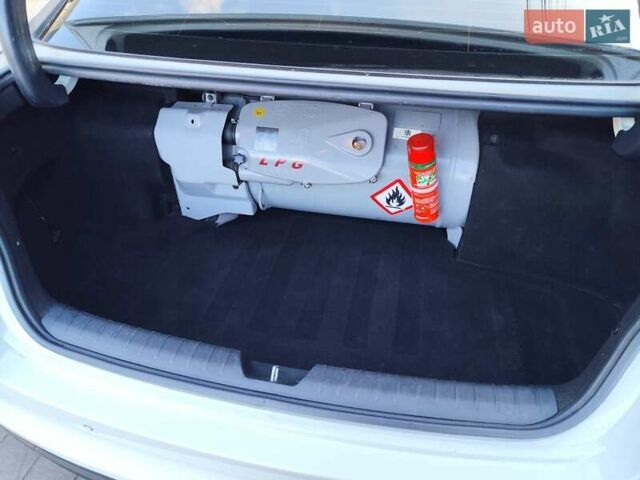 Білий Кіа K5, об'ємом двигуна 2 л та пробігом 384 тис. км за 10400 $, фото 11 на Automoto.ua