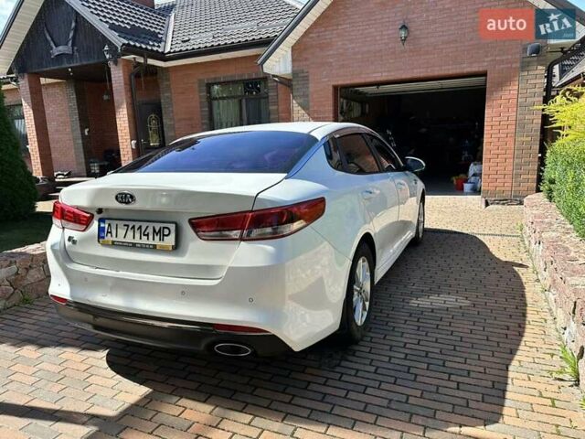 Білий Кіа K5, об'ємом двигуна 2 л та пробігом 330 тис. км за 9500 $, фото 7 на Automoto.ua