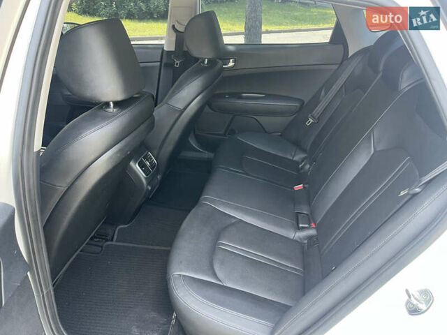 Белый Киа K5, объемом двигателя 2 л и пробегом 205 тыс. км за 12790 $, фото 11 на Automoto.ua