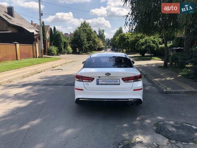 Білий Кіа K5, об'ємом двигуна 2 л та пробігом 335 тис. км за 11990 $, фото 6 на Automoto.ua