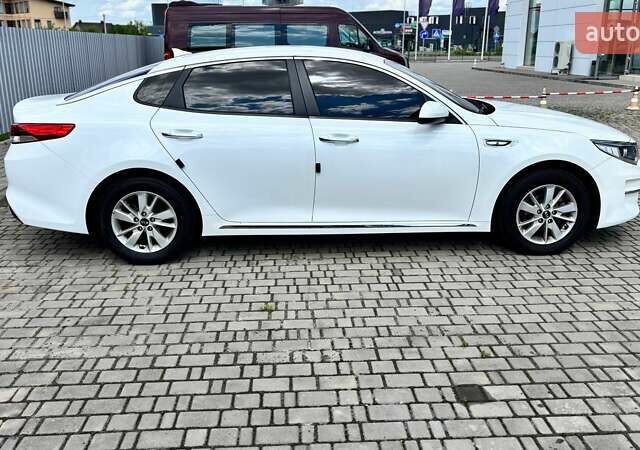 Белый Киа K5, объемом двигателя 2 л и пробегом 311 тыс. км за 11500 $, фото 5 на Automoto.ua