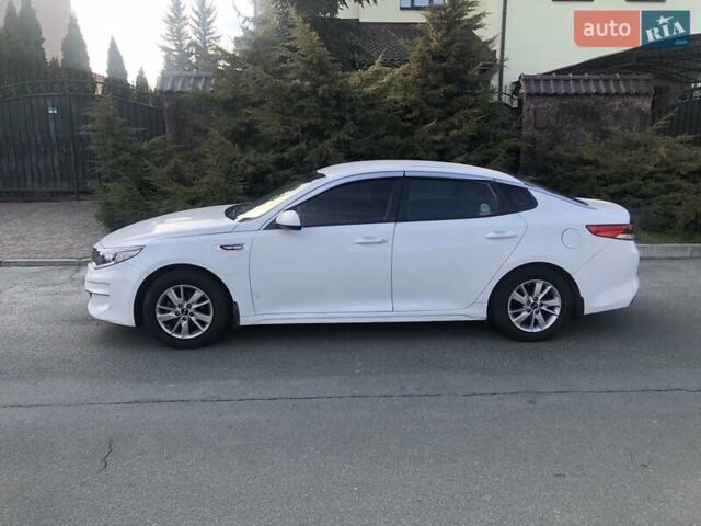 Белый Киа K5, объемом двигателя 2 л и пробегом 382 тыс. км за 8990 $, фото 6 на Automoto.ua