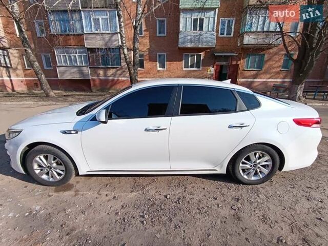 Белый Киа K5, объемом двигателя 2 л и пробегом 258 тыс. км за 11800 $, фото 18 на Automoto.ua