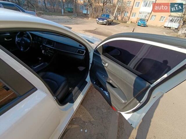 Белый Киа K5, объемом двигателя 2 л и пробегом 258 тыс. км за 11800 $, фото 10 на Automoto.ua