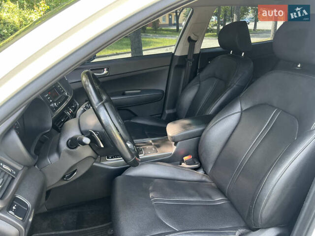 Белый Киа K5, объемом двигателя 2 л и пробегом 205 тыс. км за 12790 $, фото 9 на Automoto.ua