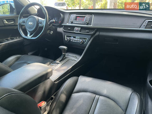 Белый Киа K5, объемом двигателя 2 л и пробегом 205 тыс. км за 12790 $, фото 6 на Automoto.ua