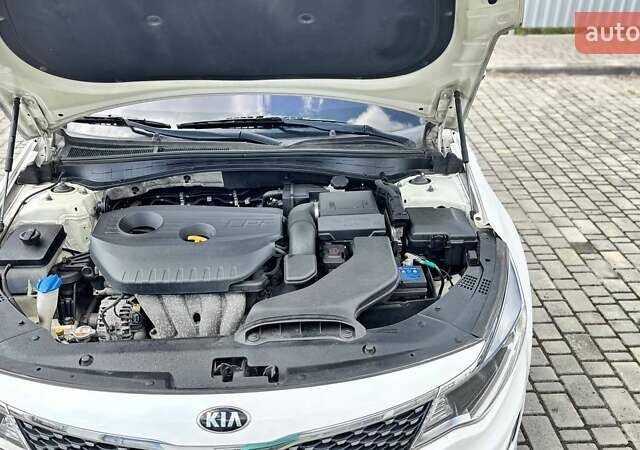 Белый Киа K5, объемом двигателя 2 л и пробегом 311 тыс. км за 11500 $, фото 45 на Automoto.ua