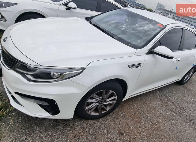 Белый Киа K5, объемом двигателя 2 л и пробегом 143 тыс. км за 15000 $, фото 4 на Automoto.ua