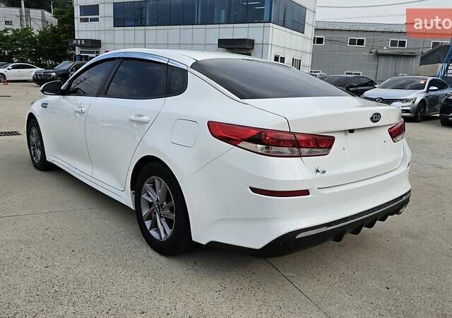 Белый Киа K5, объемом двигателя 2 л и пробегом 405 тыс. км за 12490 $, фото 5 на Automoto.ua