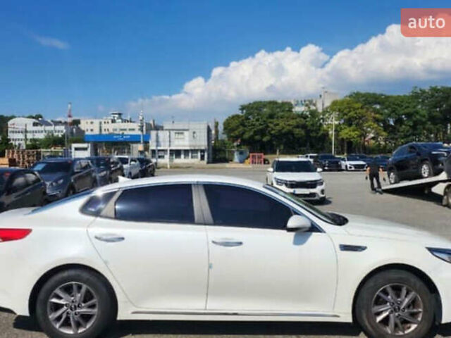 Белый Киа K5, объемом двигателя 2 л и пробегом 143 тыс. км за 16000 $, фото 1 на Automoto.ua