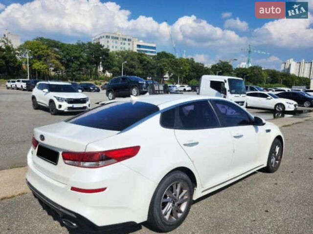 Белый Киа K5, объемом двигателя 2 л и пробегом 143 тыс. км за 16000 $, фото 2 на Automoto.ua