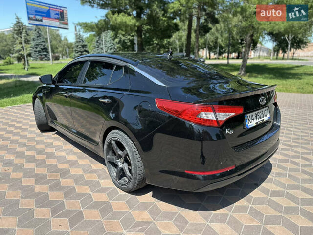 Черный Киа K5, объемом двигателя 2 л и пробегом 234 тыс. км за 7999 $, фото 3 на Automoto.ua