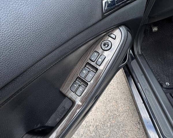 Черный Киа K5, объемом двигателя 2 л и пробегом 220 тыс. км за 7999 $, фото 8 на Automoto.ua