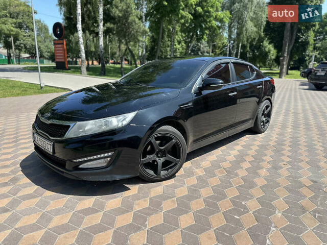 Черный Киа K5, объемом двигателя 2 л и пробегом 234 тыс. км за 7999 $, фото 4 на Automoto.ua