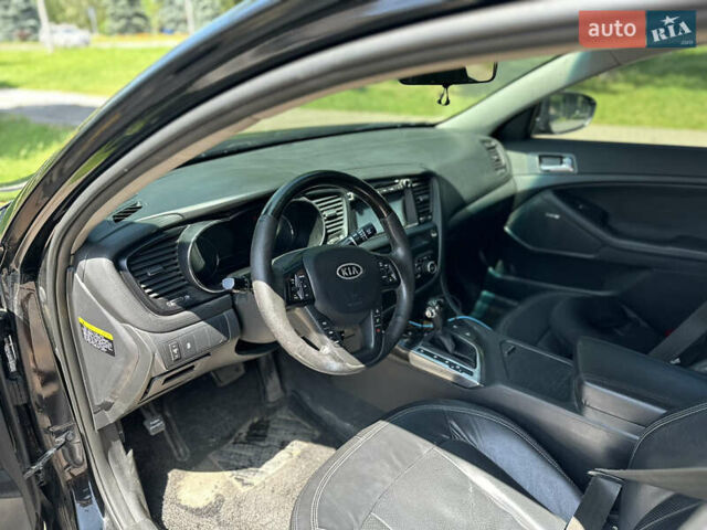 Черный Киа K5, объемом двигателя 2 л и пробегом 234 тыс. км за 7999 $, фото 5 на Automoto.ua