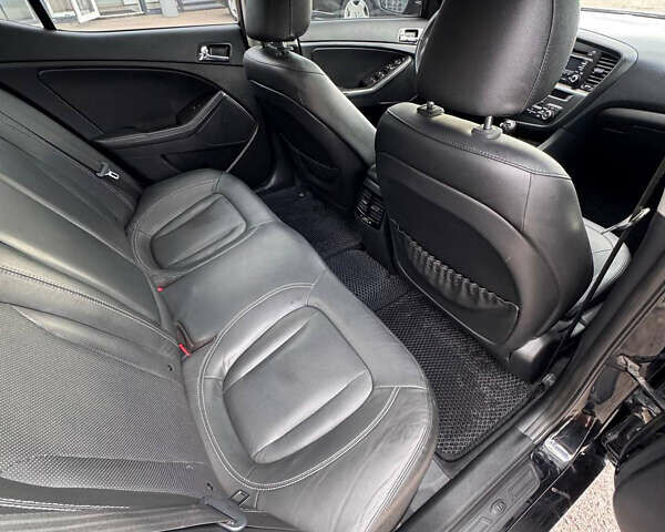 Черный Киа K5, объемом двигателя 2 л и пробегом 220 тыс. км за 7999 $, фото 13 на Automoto.ua