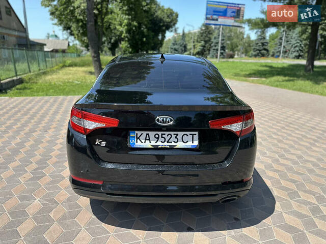 Черный Киа K5, объемом двигателя 2 л и пробегом 234 тыс. км за 7999 $, фото 2 на Automoto.ua