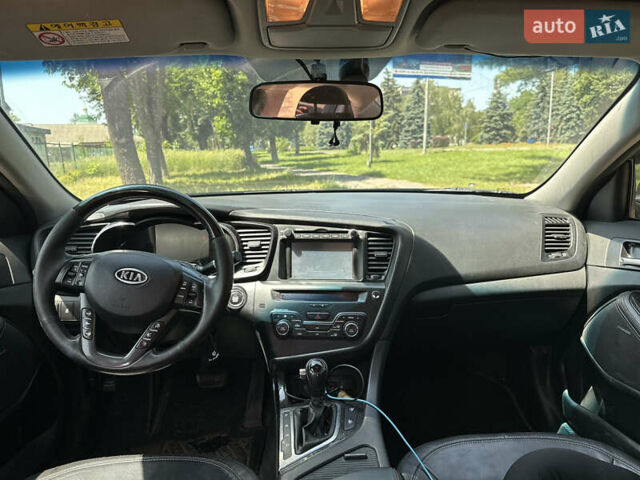 Черный Киа K5, объемом двигателя 2 л и пробегом 234 тыс. км за 7999 $, фото 9 на Automoto.ua