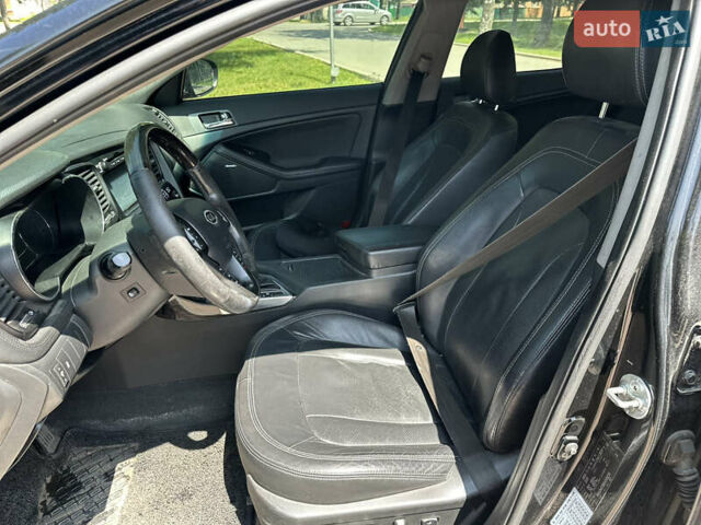 Черный Киа K5, объемом двигателя 2 л и пробегом 234 тыс. км за 7999 $, фото 6 на Automoto.ua