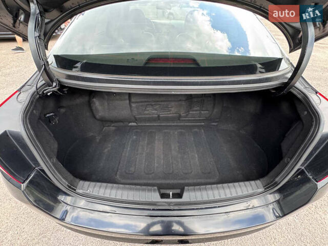 Черный Киа K5, объемом двигателя 2 л и пробегом 220 тыс. км за 7999 $, фото 16 на Automoto.ua