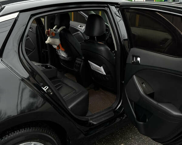 Чорний Кіа K5, об'ємом двигуна 2 л та пробігом 146 тис. км за 8999 $, фото 13 на Automoto.ua