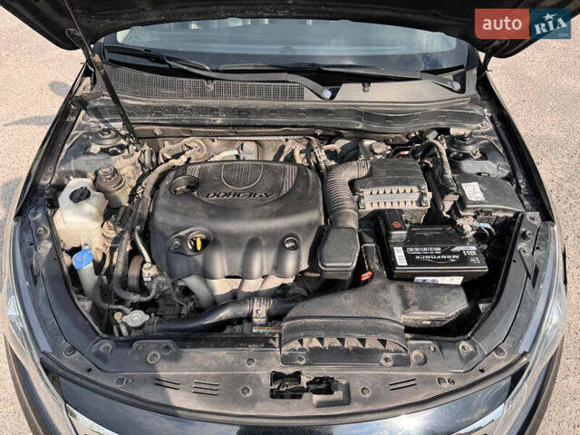 Черный Киа K5, объемом двигателя 2 л и пробегом 220 тыс. км за 7999 $, фото 18 на Automoto.ua