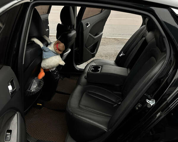 Чорний Кіа K5, об'ємом двигуна 2 л та пробігом 146 тис. км за 8999 $, фото 7 на Automoto.ua