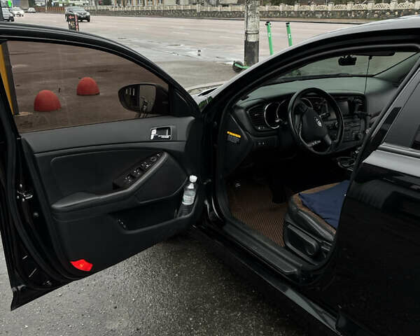 Чорний Кіа K5, об'ємом двигуна 2 л та пробігом 146 тис. км за 8999 $, фото 9 на Automoto.ua