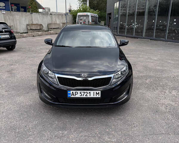 Черный Киа K5, объемом двигателя 2 л и пробегом 220 тыс. км за 7999 $, фото 1 на Automoto.ua