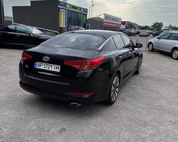 Черный Киа K5, объемом двигателя 2 л и пробегом 220 тыс. км за 7999 $, фото 6 на Automoto.ua