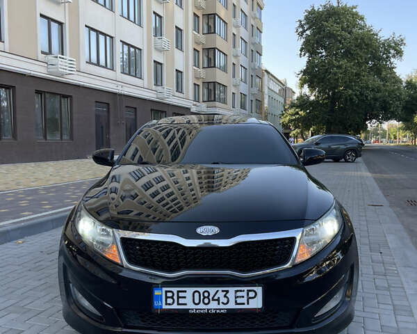 Черный Киа K5, объемом двигателя 2 л и пробегом 272 тыс. км за 8700 $, фото 1 на Automoto.ua