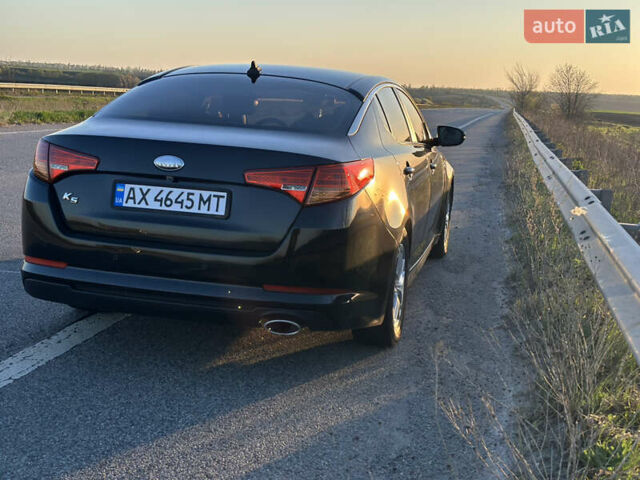 Черный Киа K5, объемом двигателя 2 л и пробегом 256 тыс. км за 9000 $, фото 5 на Automoto.ua