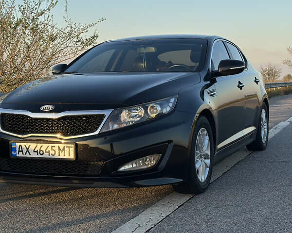 Черный Киа K5, объемом двигателя 2 л и пробегом 256 тыс. км за 9000 $, фото 12 на Automoto.ua