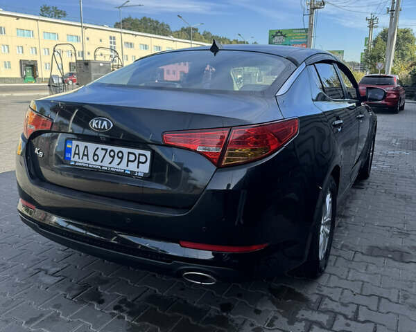 Чорний Кіа K5, об'ємом двигуна 2 л та пробігом 269 тис. км за 8600 $, фото 2 на Automoto.ua
