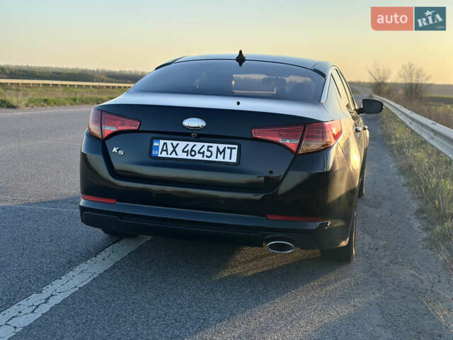 Черный Киа K5, объемом двигателя 2 л и пробегом 256 тыс. км за 9000 $, фото 7 на Automoto.ua