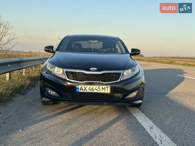 Черный Киа K5, объемом двигателя 2 л и пробегом 256 тыс. км за 9000 $, фото 9 на Automoto.ua