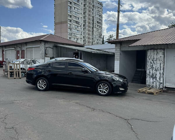 Черный Киа K5, объемом двигателя 2 л и пробегом 445 тыс. км за 6500 $, фото 2 на Automoto.ua